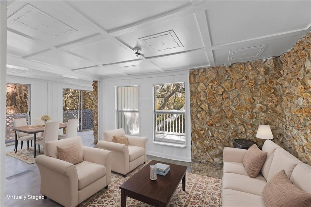 1149 Shell Crest Avenue Cedar Key, FL 32625 - Photo 31 of 32 a living room with furniture and a window