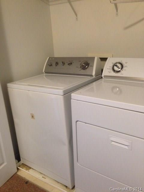 1115 Sienna Sand Way, Unit 111 Fort Mill, SC 29708 - Photo 12 of 15 a utility room with dryer and washer