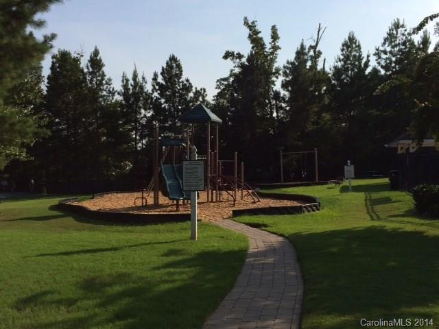1115 Sienna Sand Way, Unit 111 Fort Mill, SC 29708 - Photo 14 of 15 a view of a park with large trees
