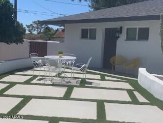 4632 North 49th Place Phoenix, AZ 85018 - Photo 12 of 13 a view of table and chair