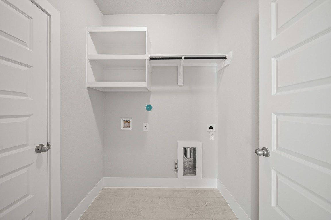 412 Elmbrook Terrace Way Waller, TX 77484 - Photo 23 of 38 a view of a room with shelf