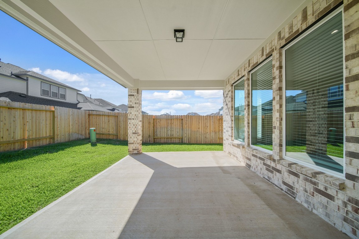 412 Elmbrook Terrace Way Waller, TX 77484 - Photo 24 of 38 a view of a backyard