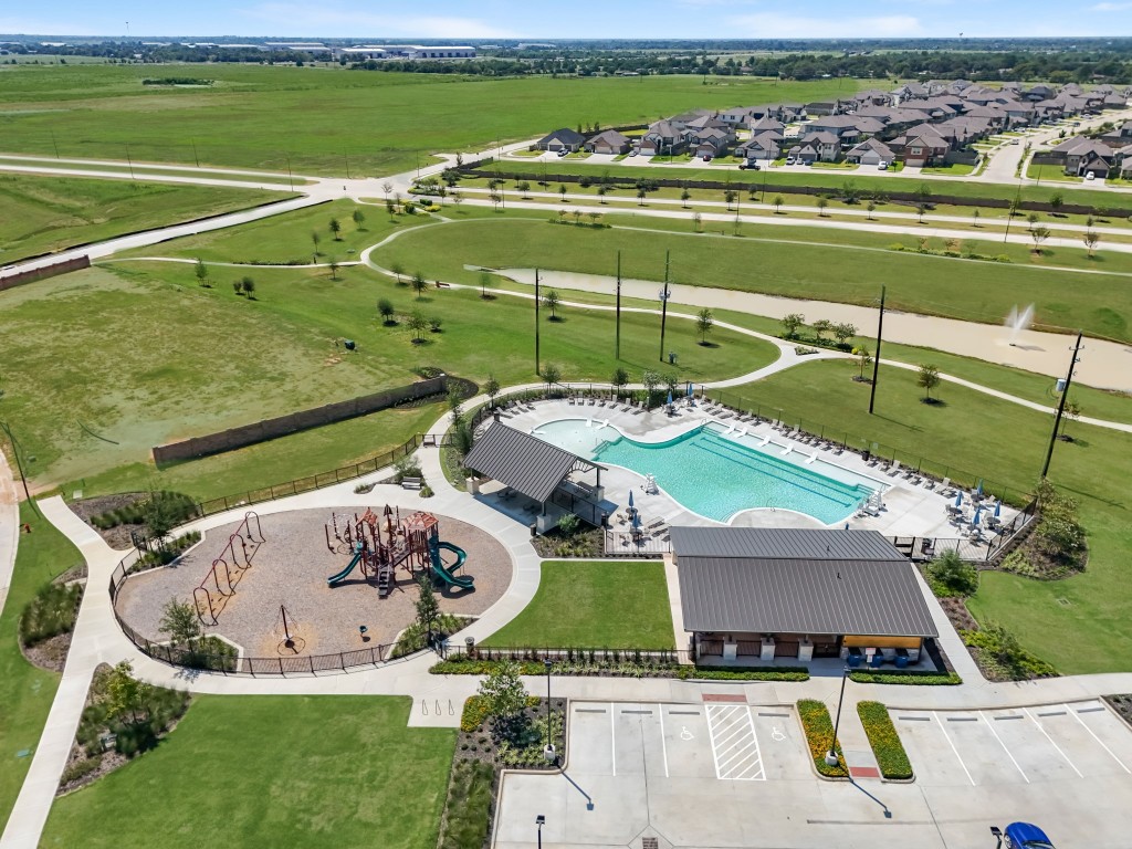 412 Elmbrook Terrace Way Waller, TX 77484 - Photo 32 of 38 an aerial view of a house with a swimming pool