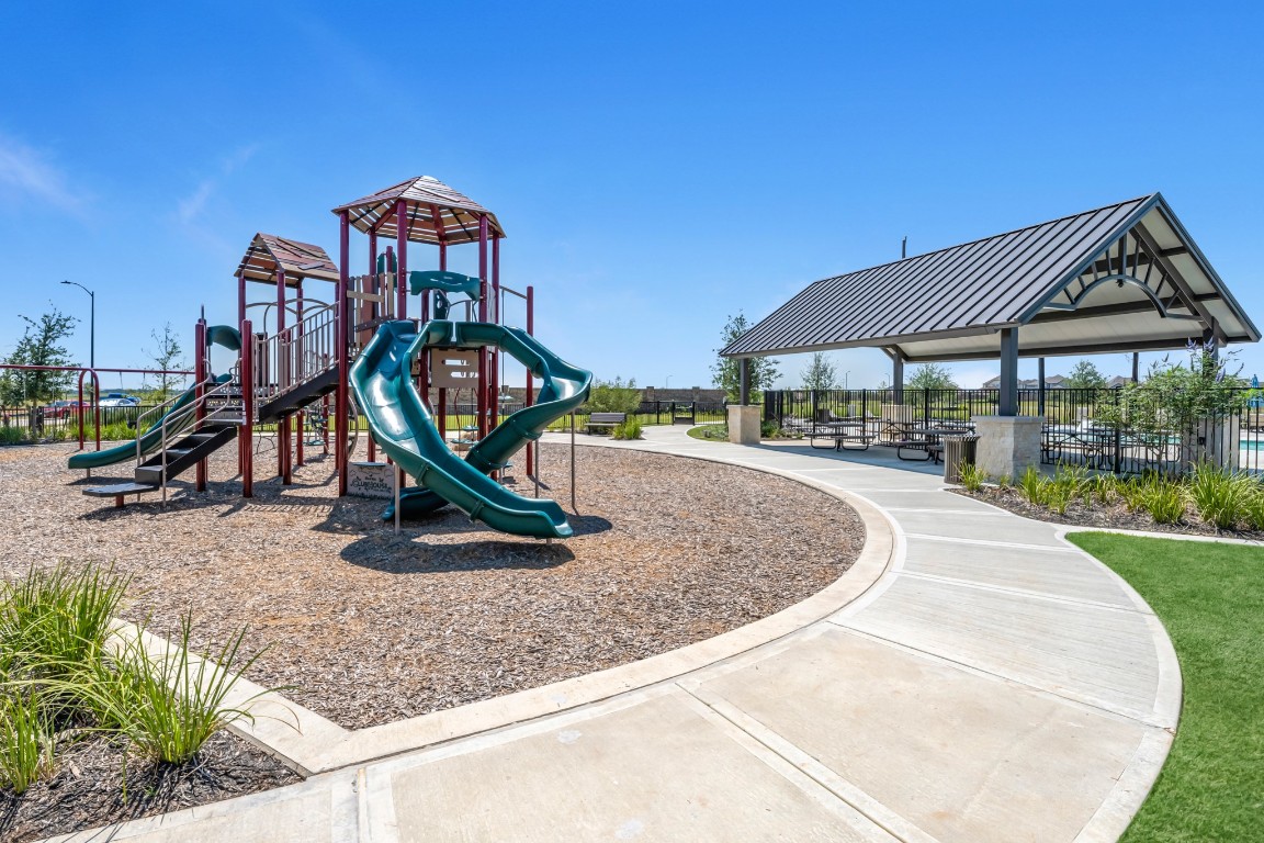412 Elmbrook Terrace Way Waller, TX 77484 - Photo 35 of 38 a park view with a slide