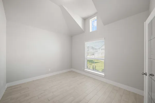 an empty room with windows