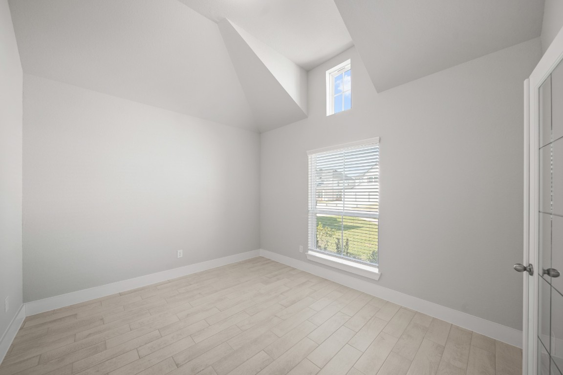 412 Elmbrook Terrace Way Waller, TX 77484 - Photo 9 of 38 an empty room with windows