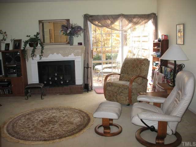 1333 Springlawn Court Raleigh, NC 27609 - Photo 6 of 11 Livingroom with sliding doors leading to private deck