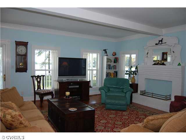 729 Buzzards Point Road Reedville, VA 22539 - Photo 3 of 11 Living Room - WOOD BURNING FIREPLACE