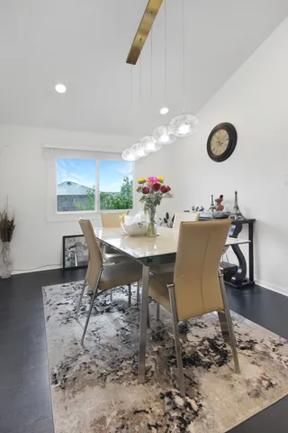 a view of a dining room with furniture