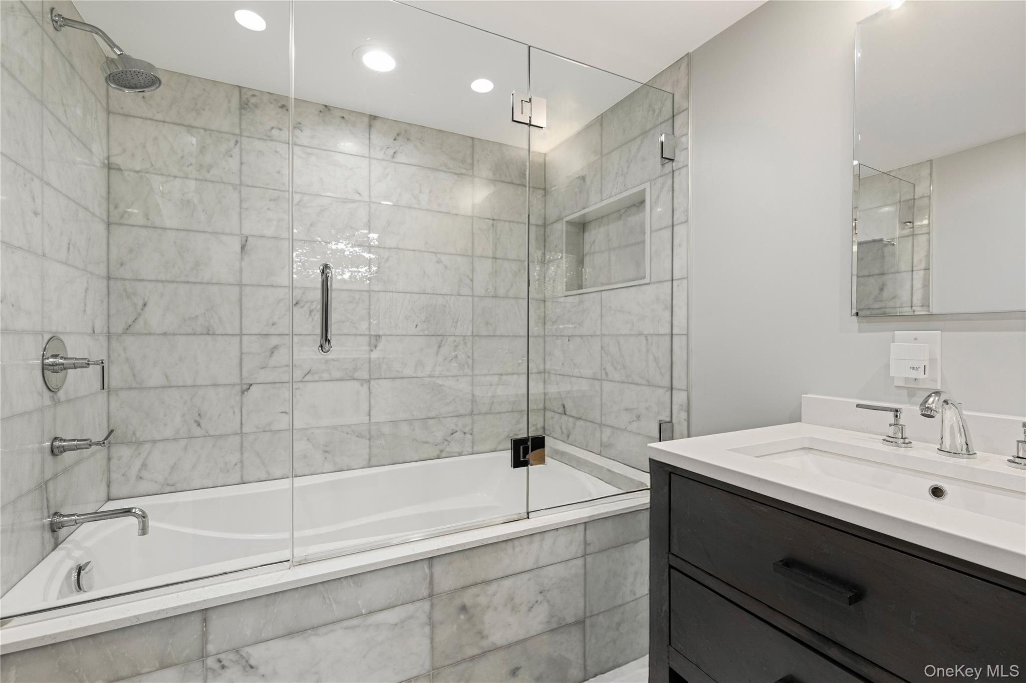 86 Seven Bridges Road Chappaqua, NY 10514 - Photo 17 of 33 a bathroom with a bathtub and a sink