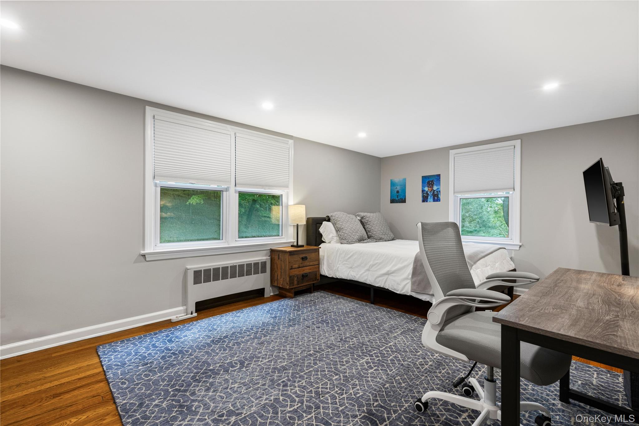 86 Seven Bridges Road Chappaqua, NY 10514 - Photo 18 of 33 a bedroom with furniture and a window