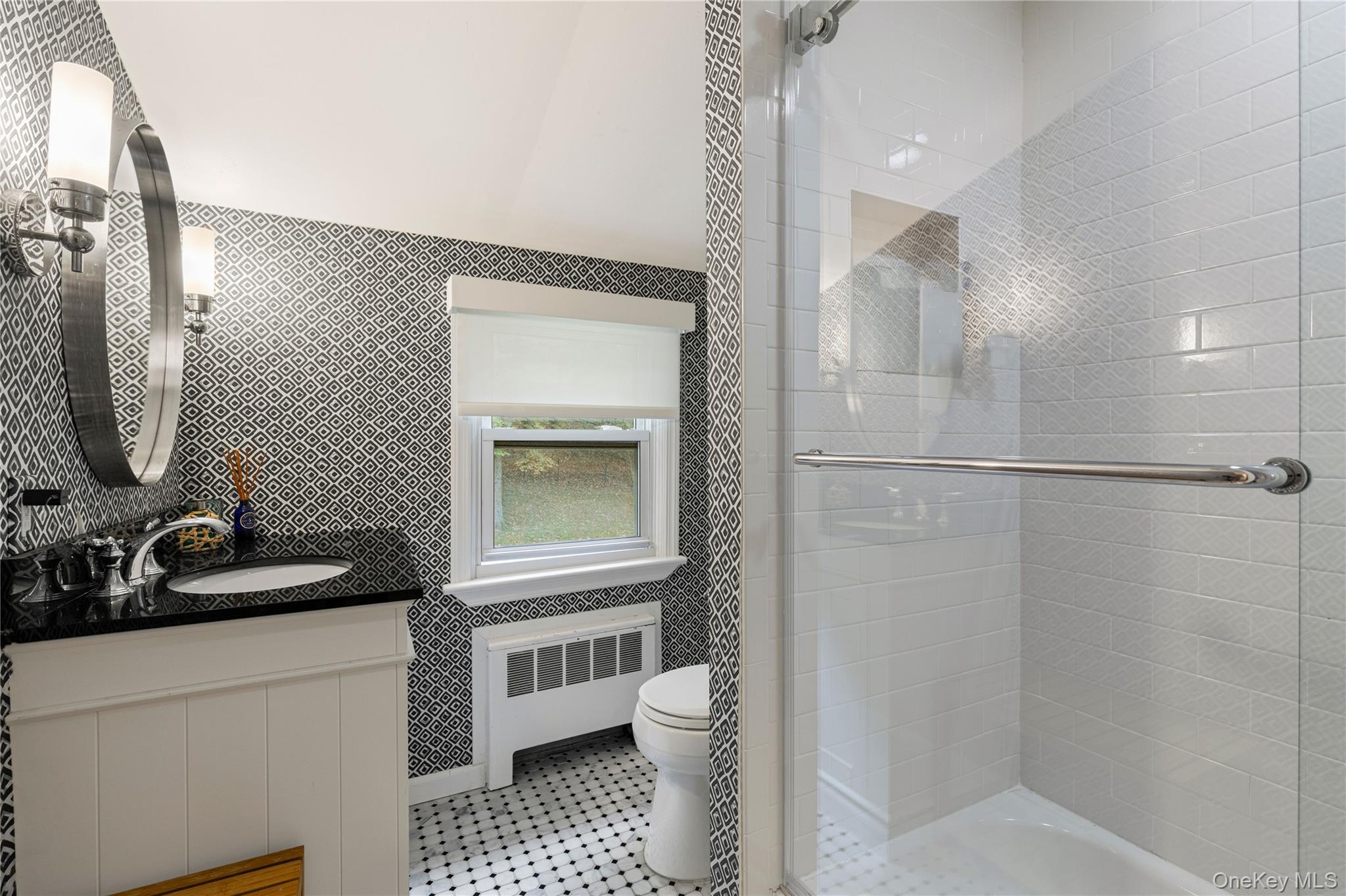 86 Seven Bridges Road Chappaqua, NY 10514 - Photo 22 of 33 a bathroom with a toilet sink and a mirror