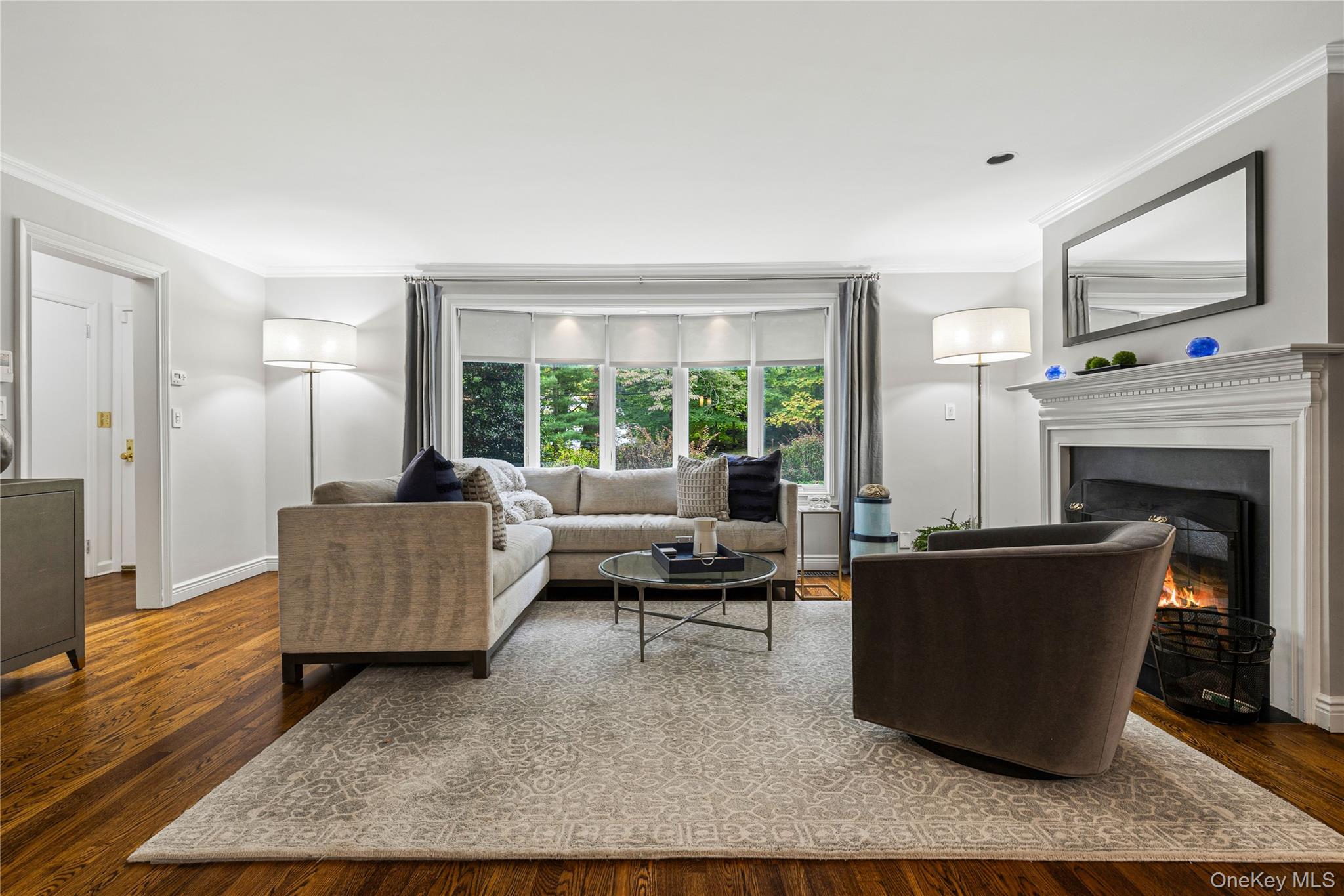 86 Seven Bridges Road Chappaqua, NY 10514 - Photo 3 of 33 a living room with furniture and a flat screen tv