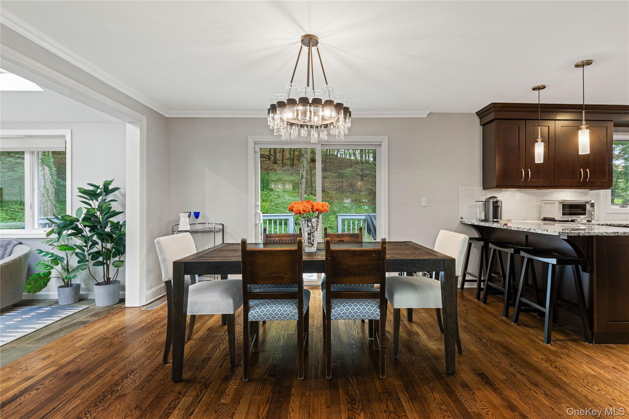 86 Seven Bridges Road Chappaqua, NY 10514 - Photo 8 of 33 a view of a dining room with furniture window and wooden floor