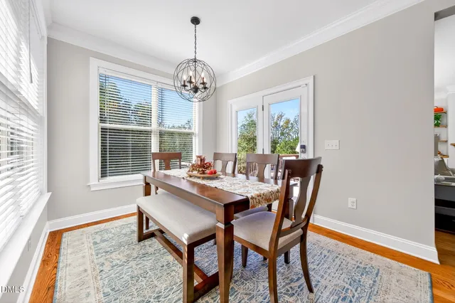 a bedroom with a bed couch and window