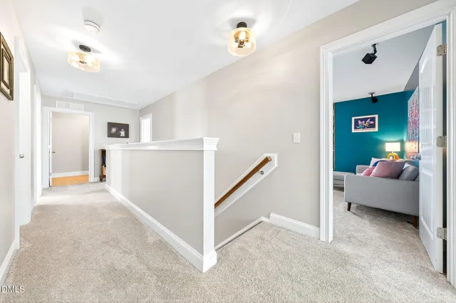 a bedroom with a bed couch and window