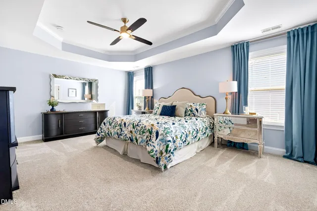 a large white kitchen with a large window