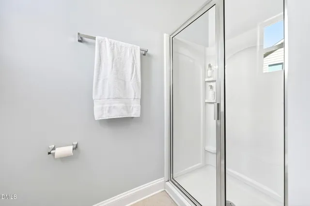 a view of a house with swimming pool and porch