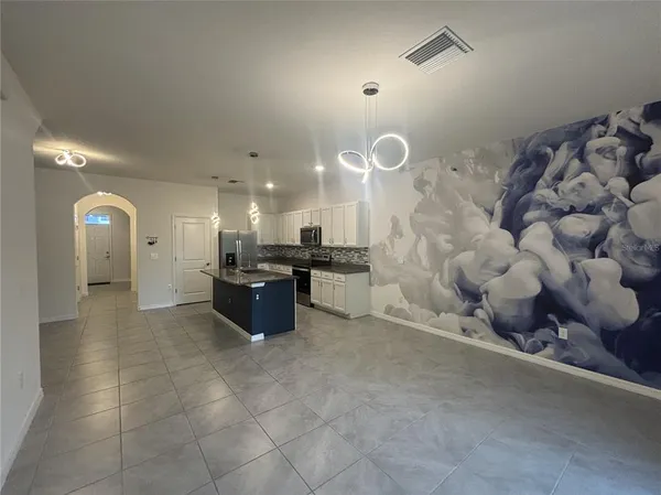 a large room with lot of shelves
