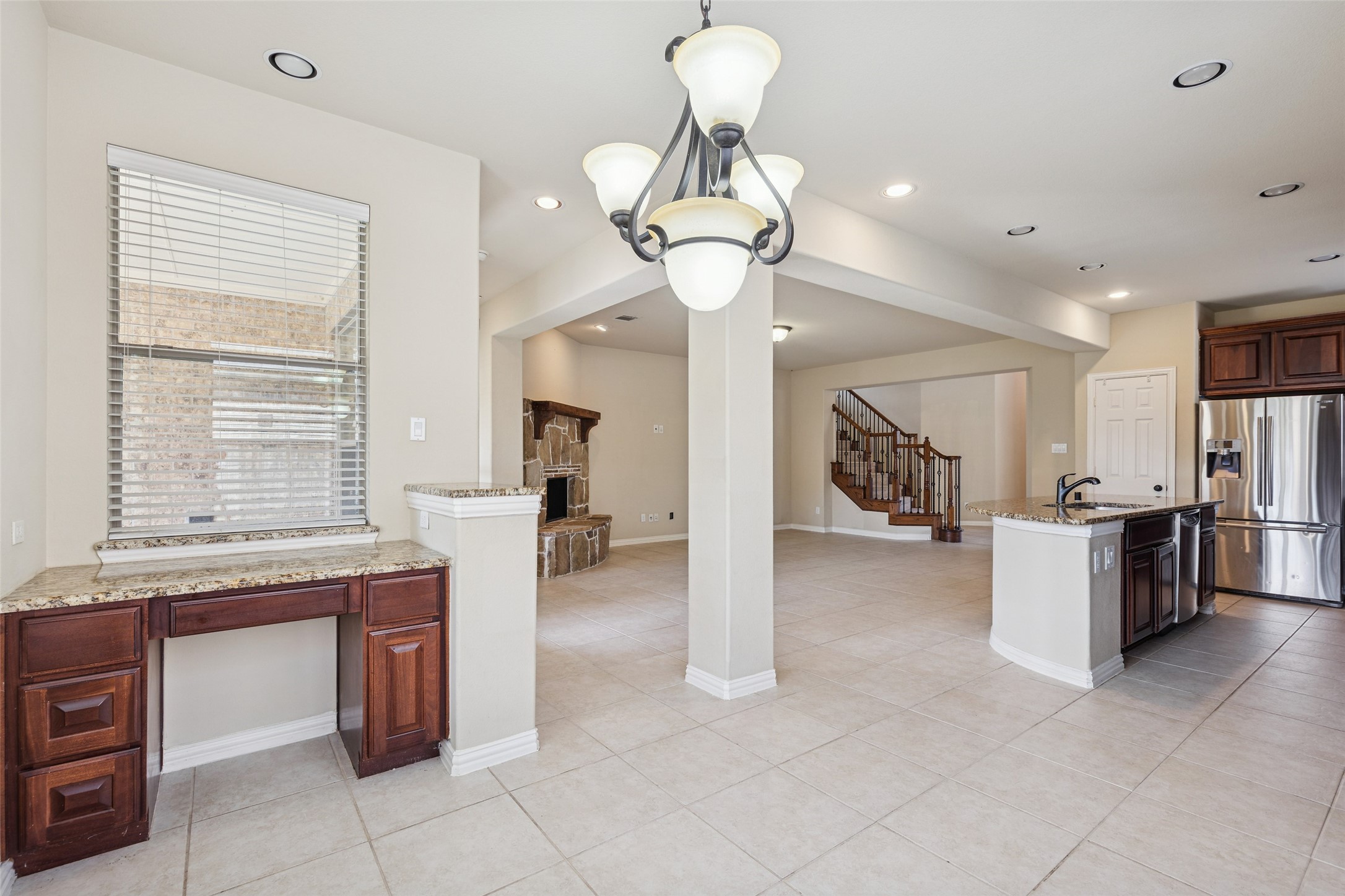 11 Vershire Circle Magnolia, TX 77354 - Photo 18 of 44 a view of a kitchen with furniture and a chandelier