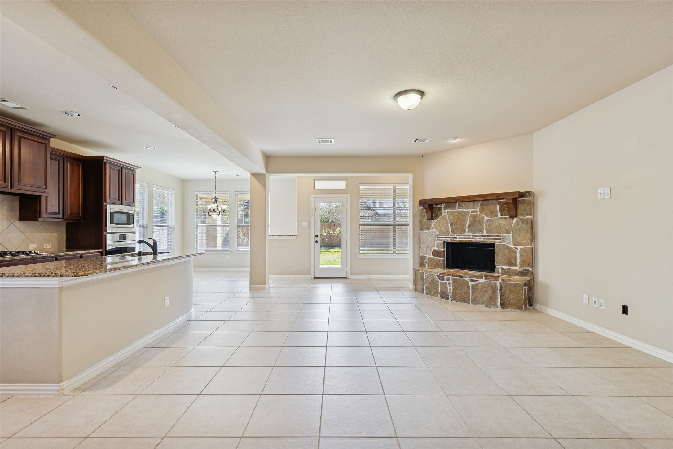 11 Vershire Circle Magnolia, TX 77354 - Photo 10 of 44 a large white kitchen with cabinets
