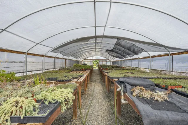 an aerial view of residential building with parking space