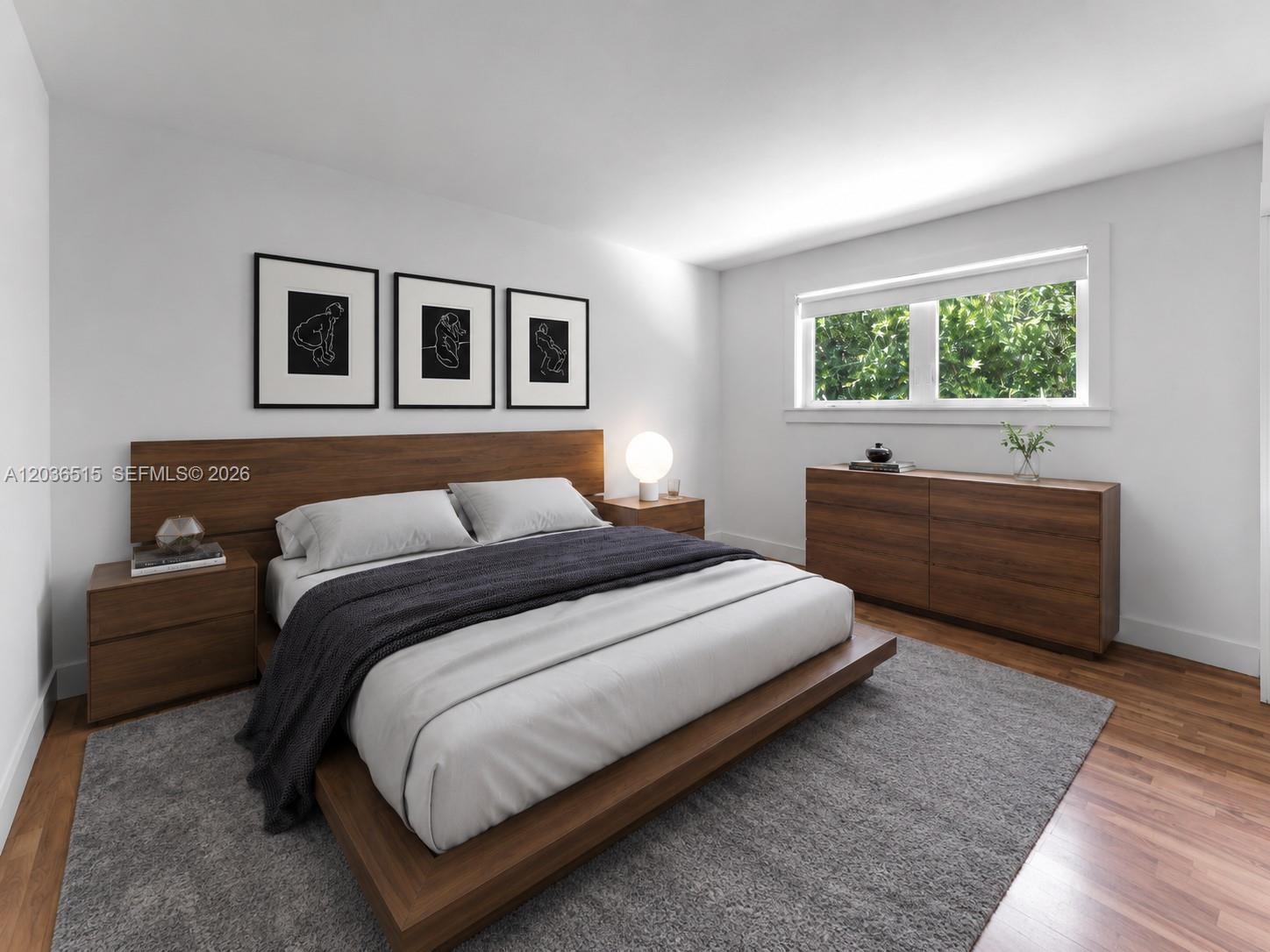7711 Erwin Road Coral Gables, FL 33143 - Photo 18 of 26 a bedroom with bed and window