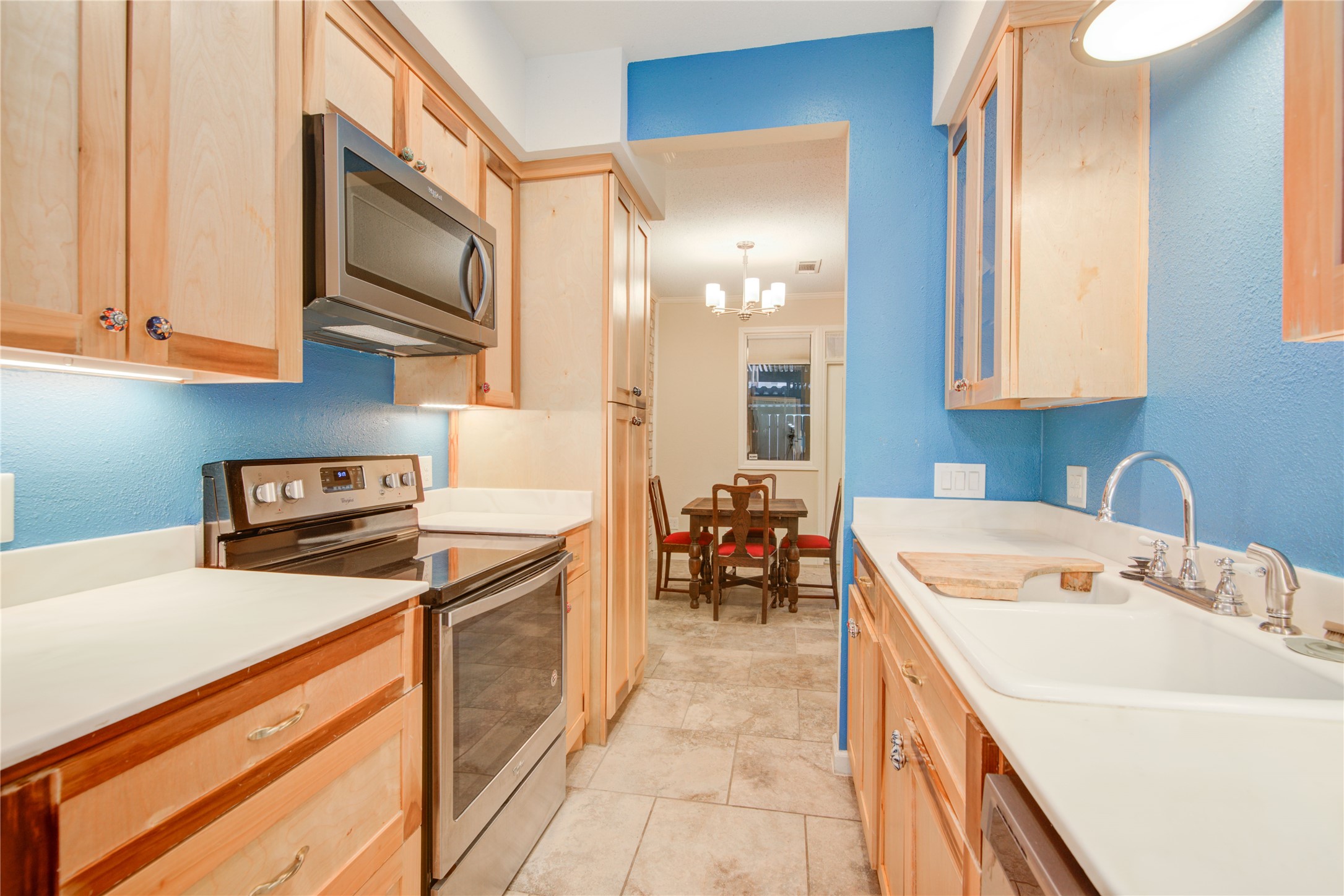 7449 Brompton Street, Unit 7449 Houston, TX 77025 - Photo 13 of 46 Comfortable kitchen w/ plenty of storage & pantry space