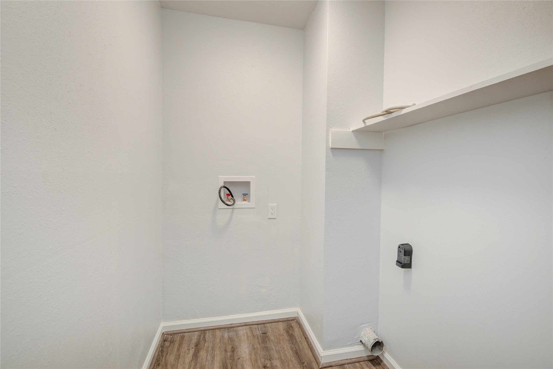 7449 Brompton Street, Unit 7449 Houston, TX 77025 - Photo 28 of 46 a view of a room with shelf