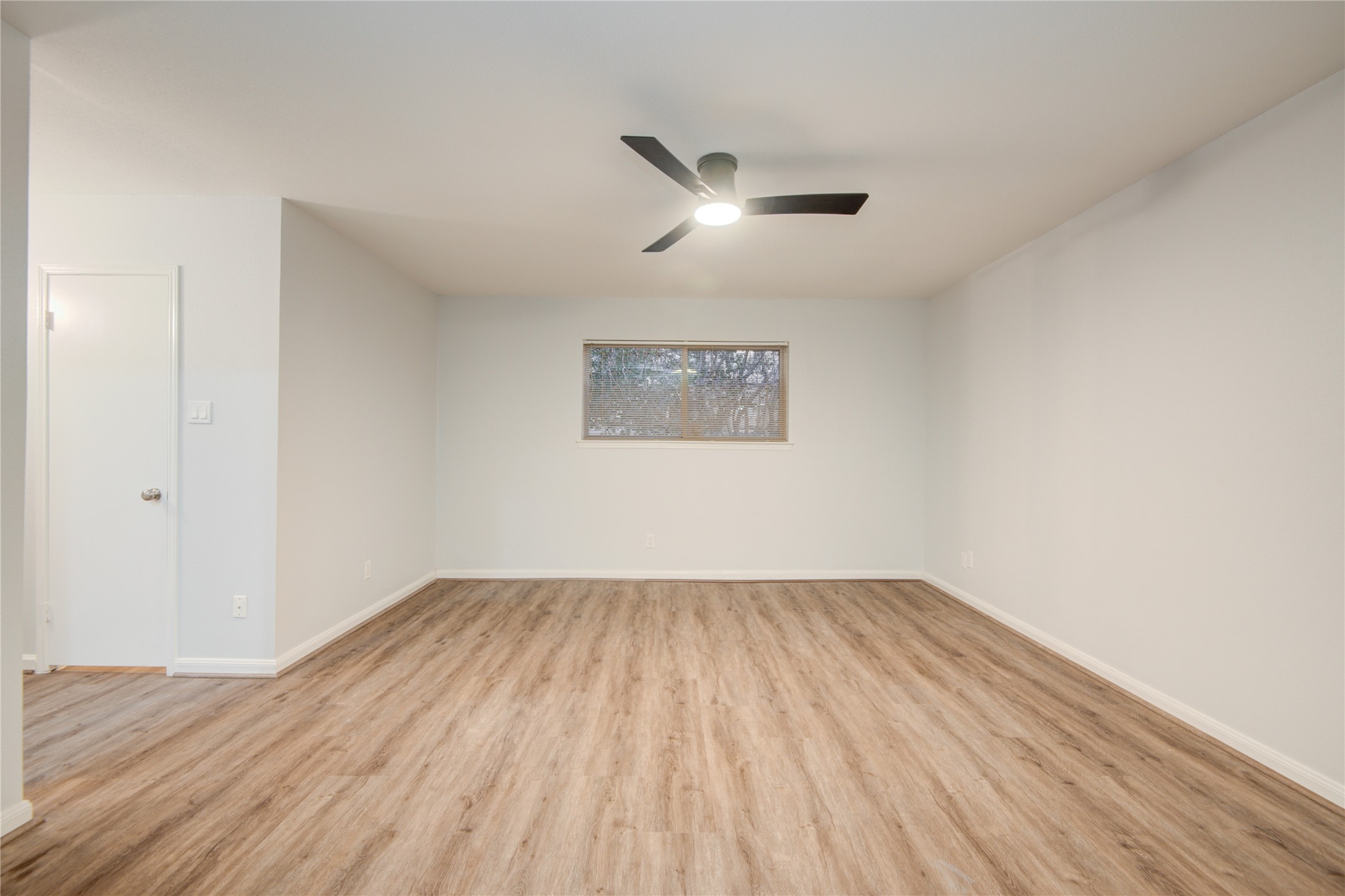 7449 Brompton Street, Unit 7449 Houston, TX 77025 - Photo 29 of 46 This is the oversized primary bedroom w/ new LVT floors & paint