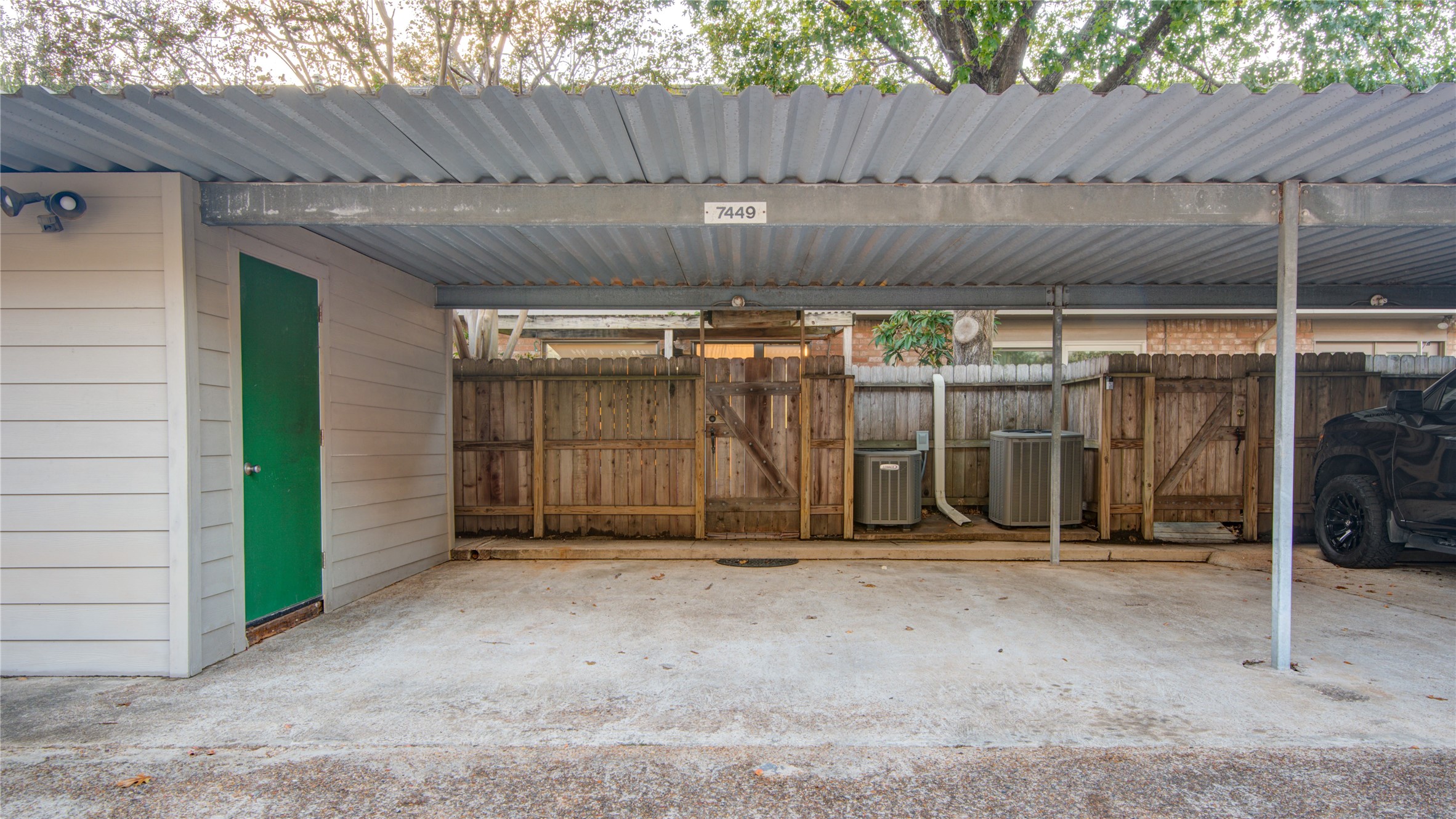 7449 Brompton Street, Unit 7449 Houston, TX 77025 - Photo 38 of 46 2 reserved covered parking spaces & storage