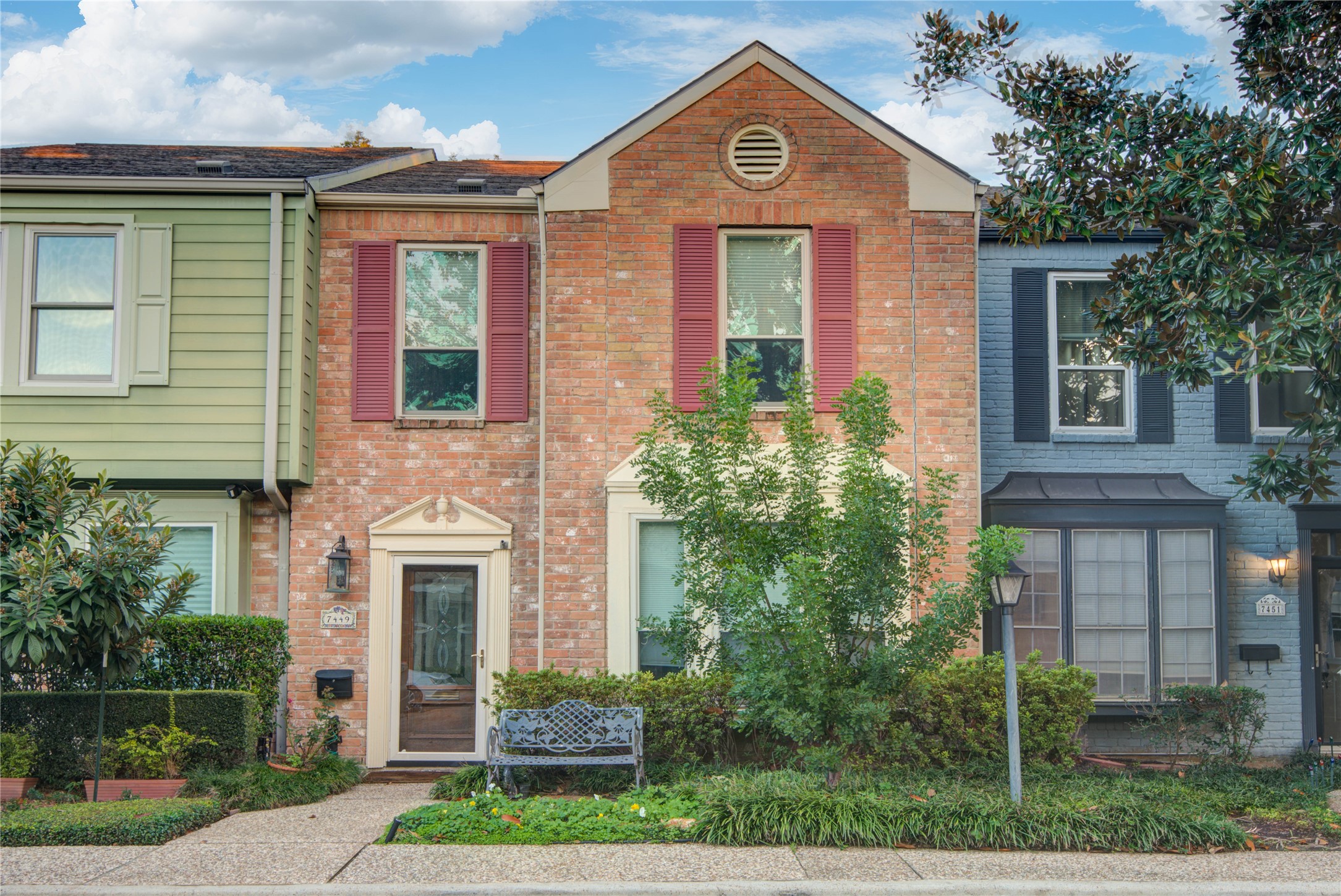 7449 Brompton Street, Unit 7449 Houston, TX 77025 - Photo 5 of 46 a front view of a house with garden