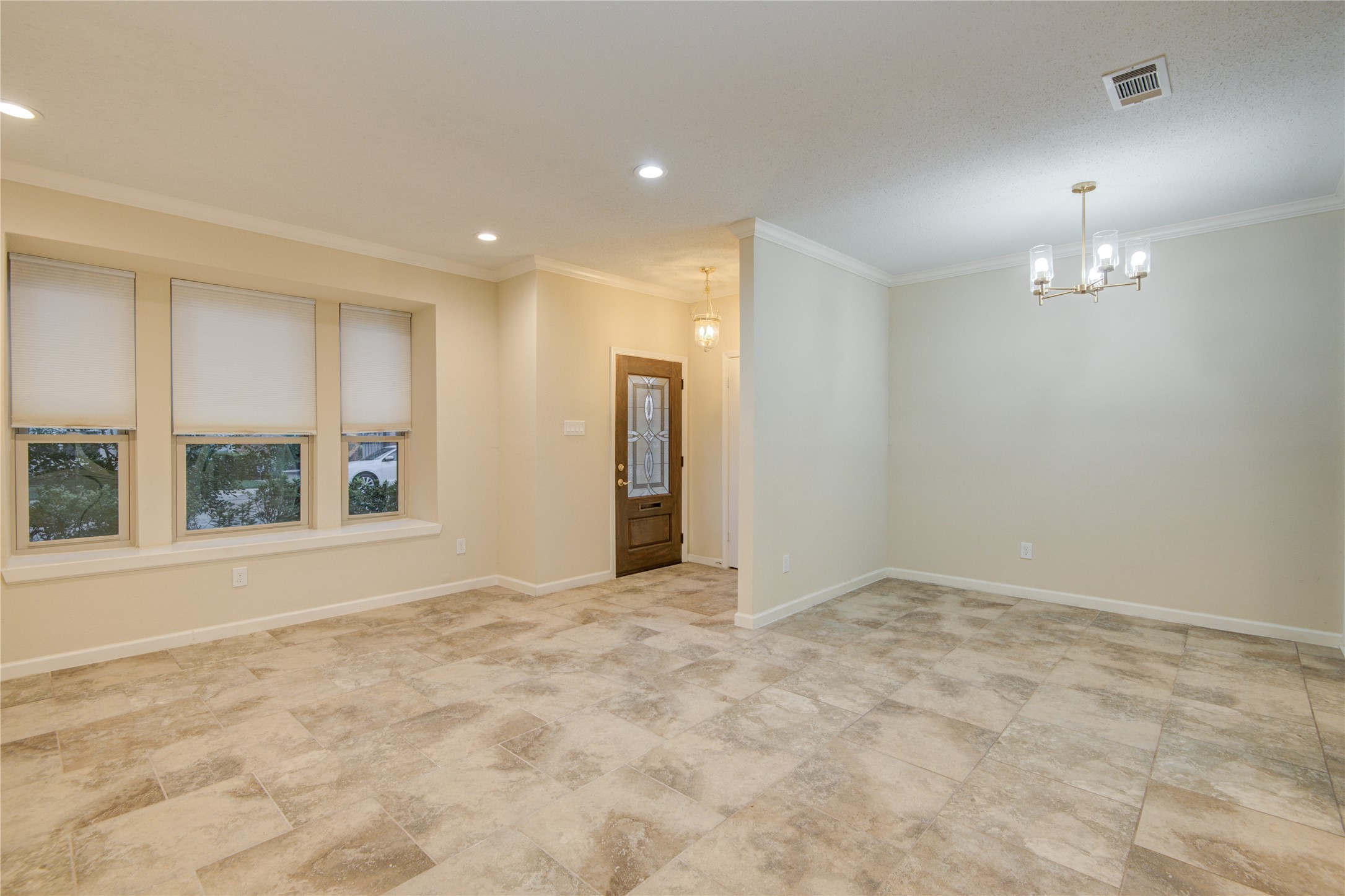 7449 Brompton Street, Unit 7449 Houston, TX 77025 - Photo 8 of 46 Beautiful tile throughout downstairs w/ bay window to the front landscaping