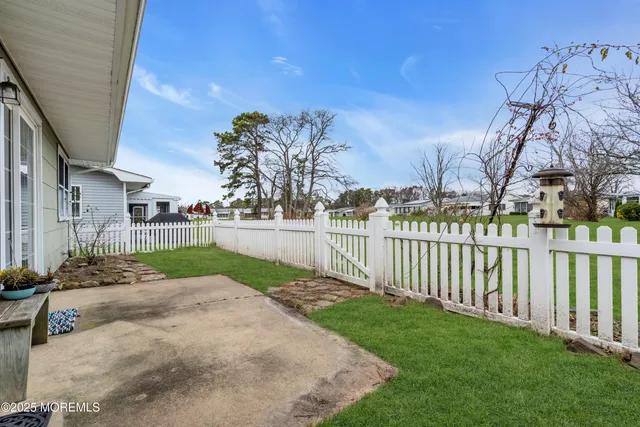 a view of street with small yard