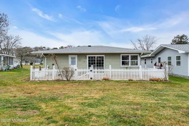 a house view with a garden space
