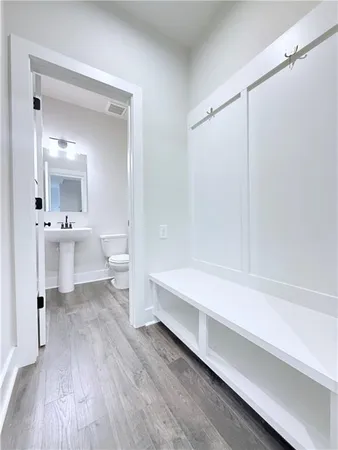 a bathroom with a bathtub and a toilet