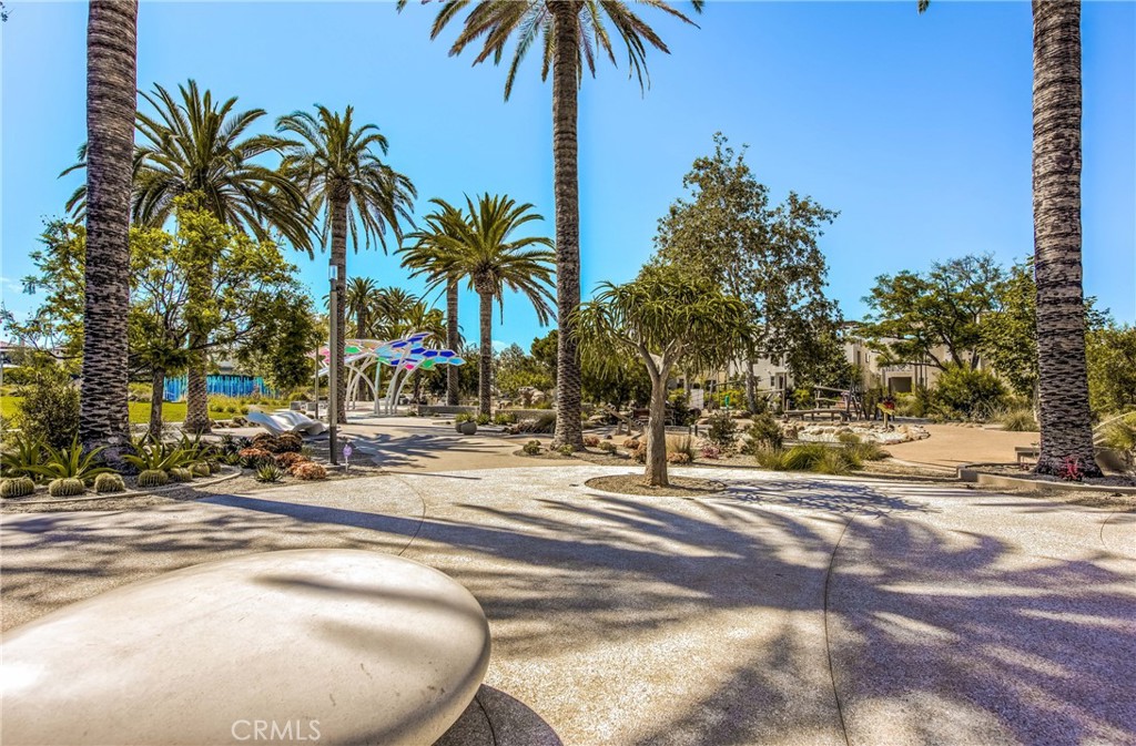 186 Terrapin Irvine, CA 92618 - Photo 25 of 39 a row of palm trees sitting in a backyard of a house