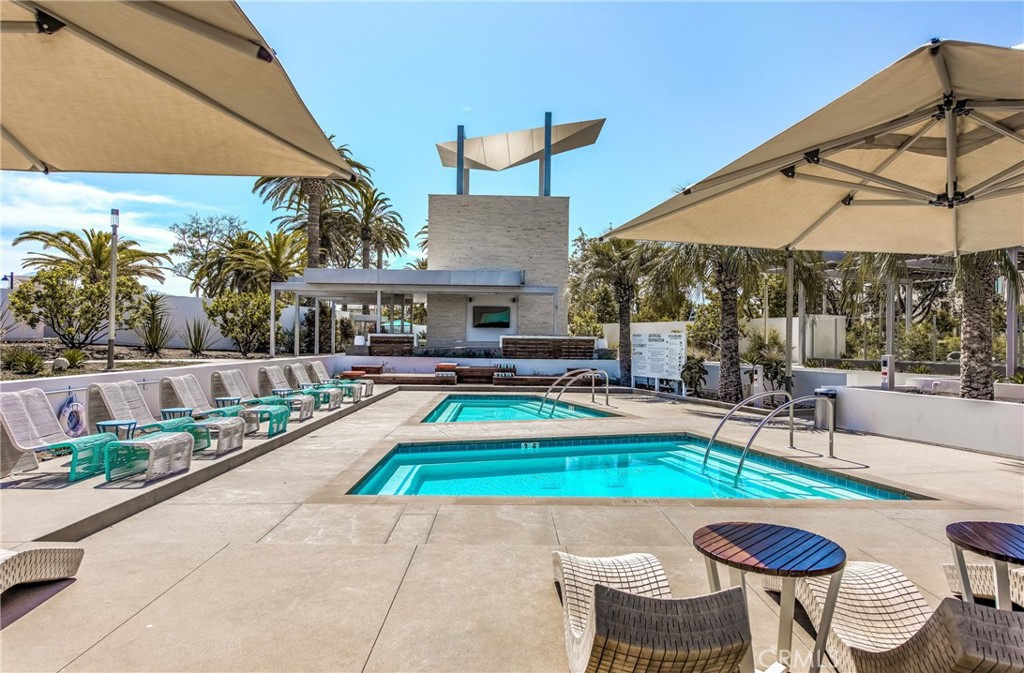 186 Terrapin Irvine, CA 92618 - Photo 26 of 39 a view of swimming pool with outdoor seating and a patio