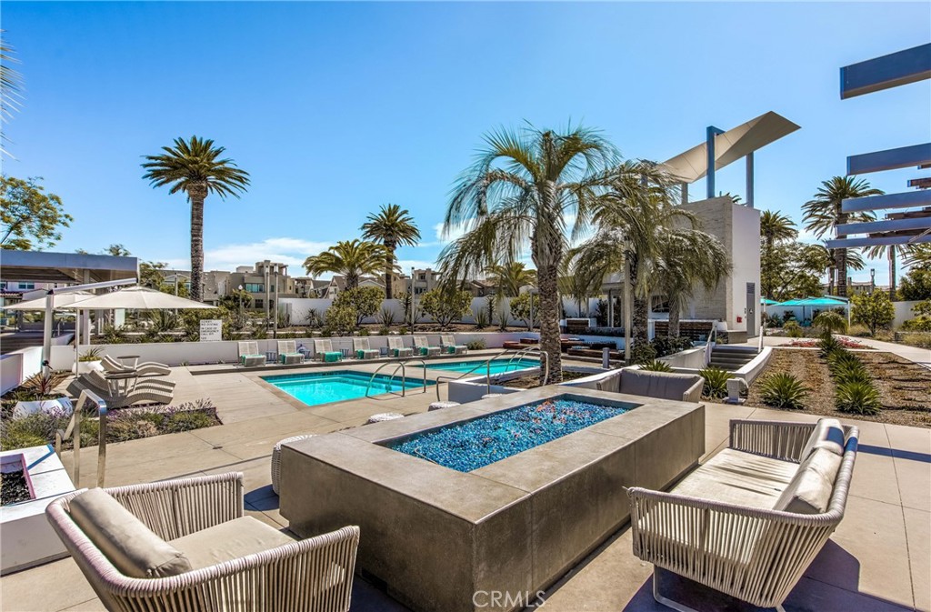 186 Terrapin Irvine, CA 92618 - Photo 29 of 39 a view of a swimming pool with lounge chairs