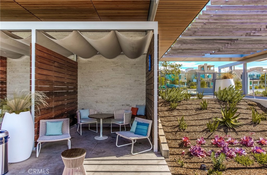 186 Terrapin Irvine, CA 92618 - Photo 31 of 39 a building outdoor space with patio furniture and potted plants