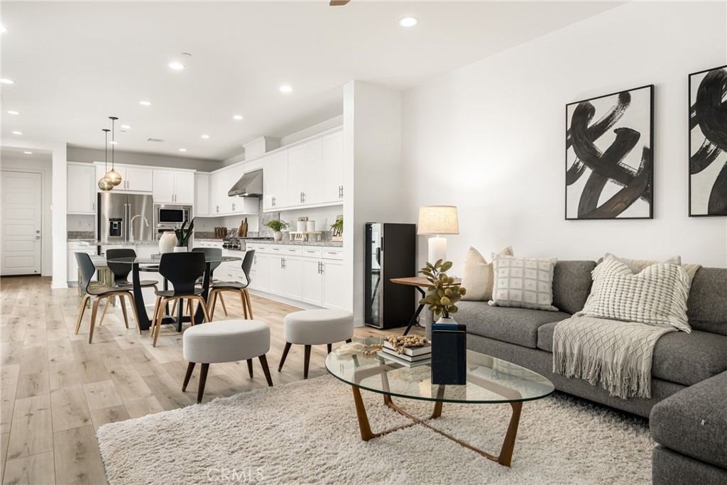186 Terrapin Irvine, CA 92618 - Photo 6 of 39 a living room with furniture and kitchen view
