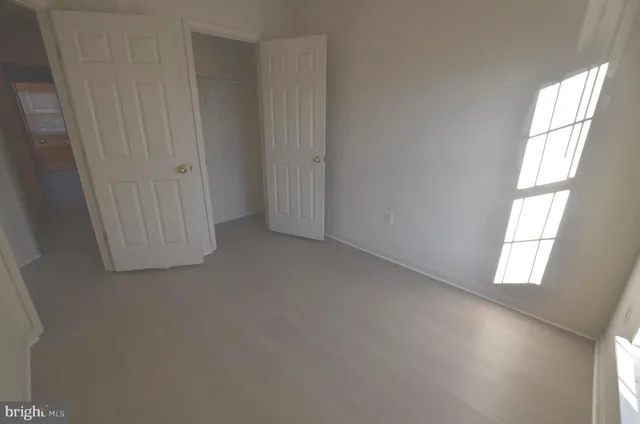 a view of a balcony with door