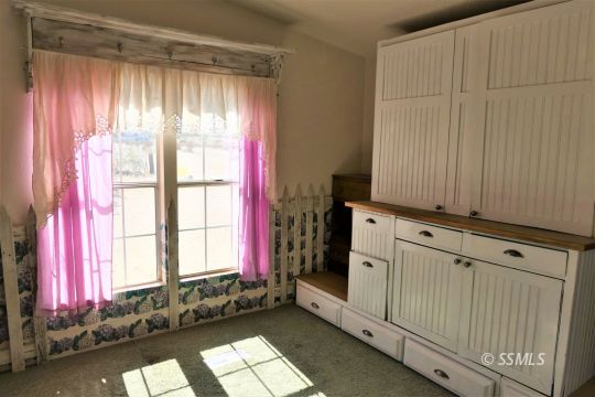 400 South Guam Street Ridgecrest, CA 93555 - Photo 27 of 39 a view of a kitchen with dishwasher and window