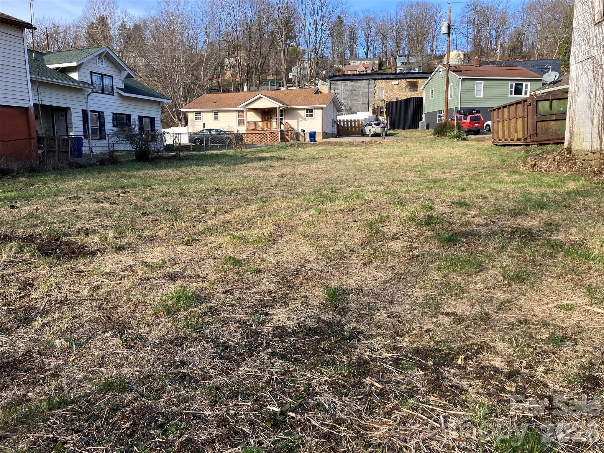 Tbd Valley Street Canton, NC 28716 - Photo 4 of 7 a view of residential houses with cars parked in front of it