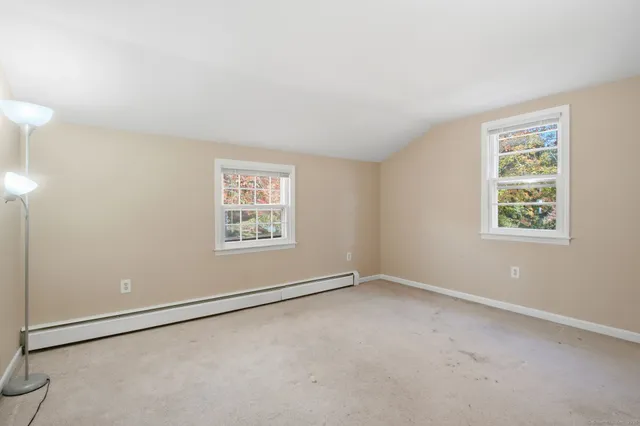 an empty room with windows