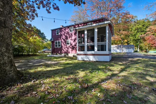 a view of a house with a yard