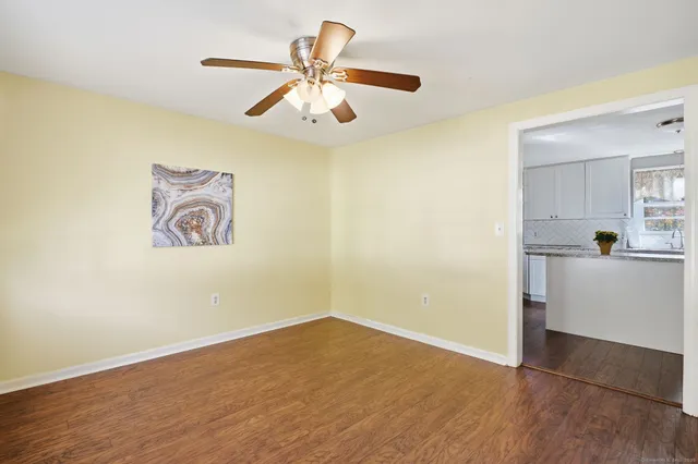 a view of a livingroom with wooden floor
