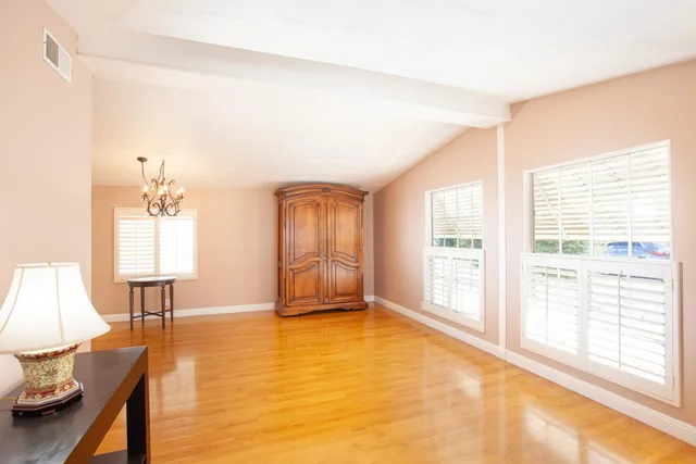 a view of an empty room and window