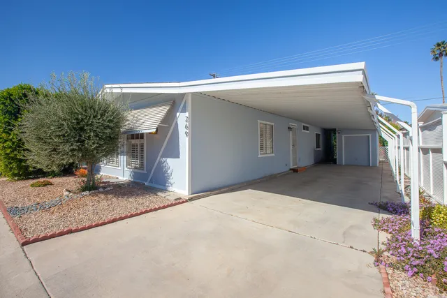 a view of a house with a garage