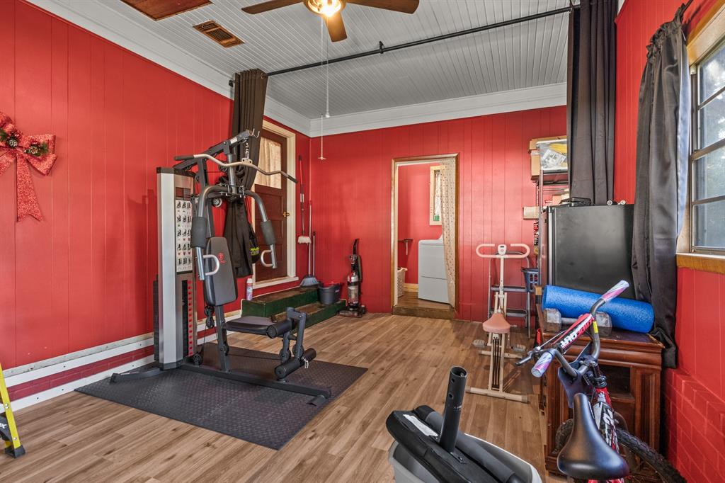 1210 East 4th Street Mount Pleasant, TX 75455 - Photo 20 of 28 a view of a room with gym equipment